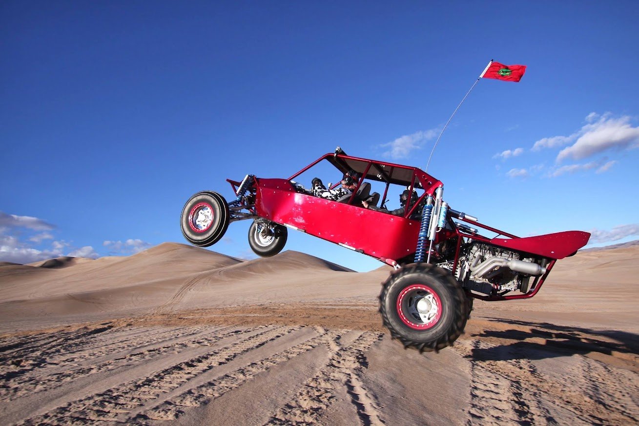 Red sandrail doing a wheelie at Dumont Dunes